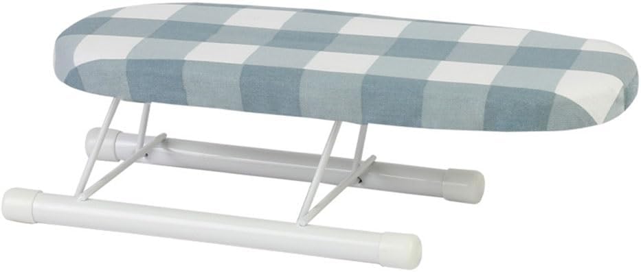 Une planche de table reunit une structure pliante et un format compact