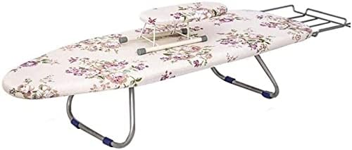 Cette table de repassage a surface permeable a la vapeur en coloris blanc et gris
