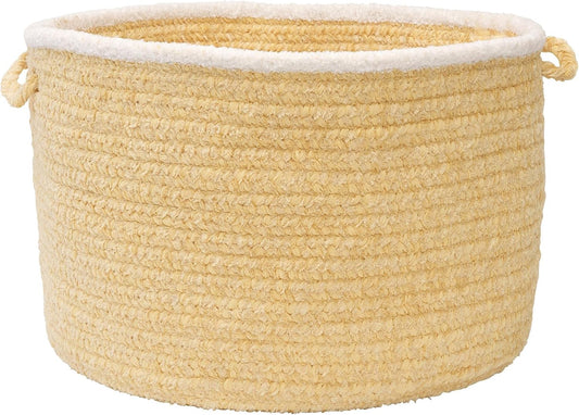 Un panier a linge avec poignee de maintien en coloris beige et orange